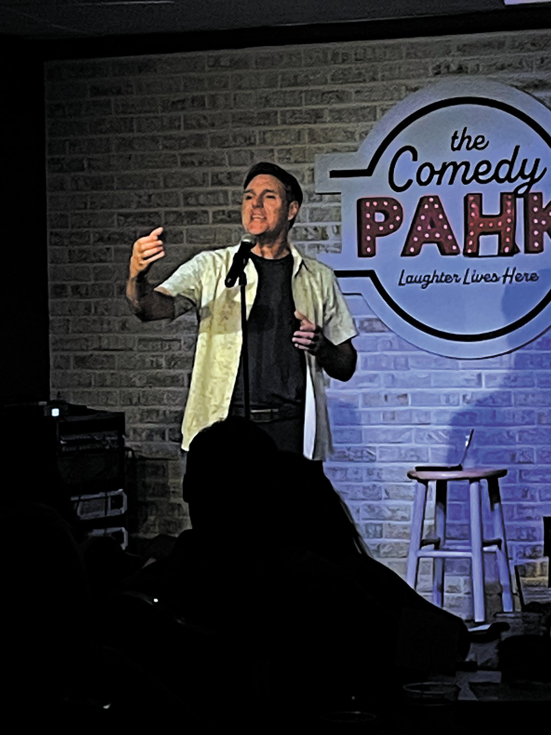 CRANSTON’S FUNNY GUY: Al Ducharme performing at his induction ceremony to the Rhode Island Comedy Hall of Fame at the Comedy Park on July 23.